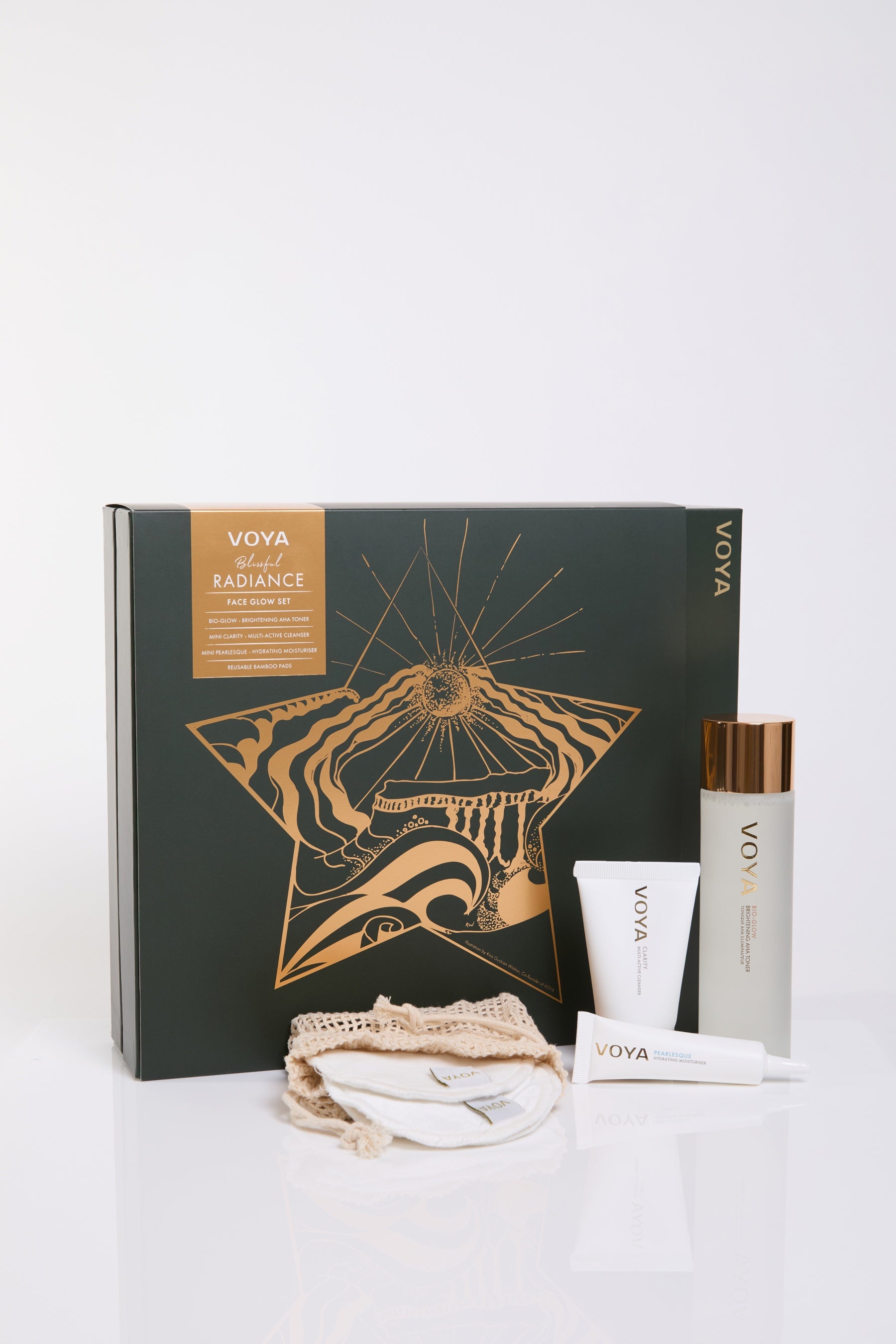 VOYA Blissful Radiance Facial Gift Set containing Bio-Glow AHA Toner, Mini Clarity Cleanser, Mini Pearlesque Moisturiser and three reusable bamboo pads.