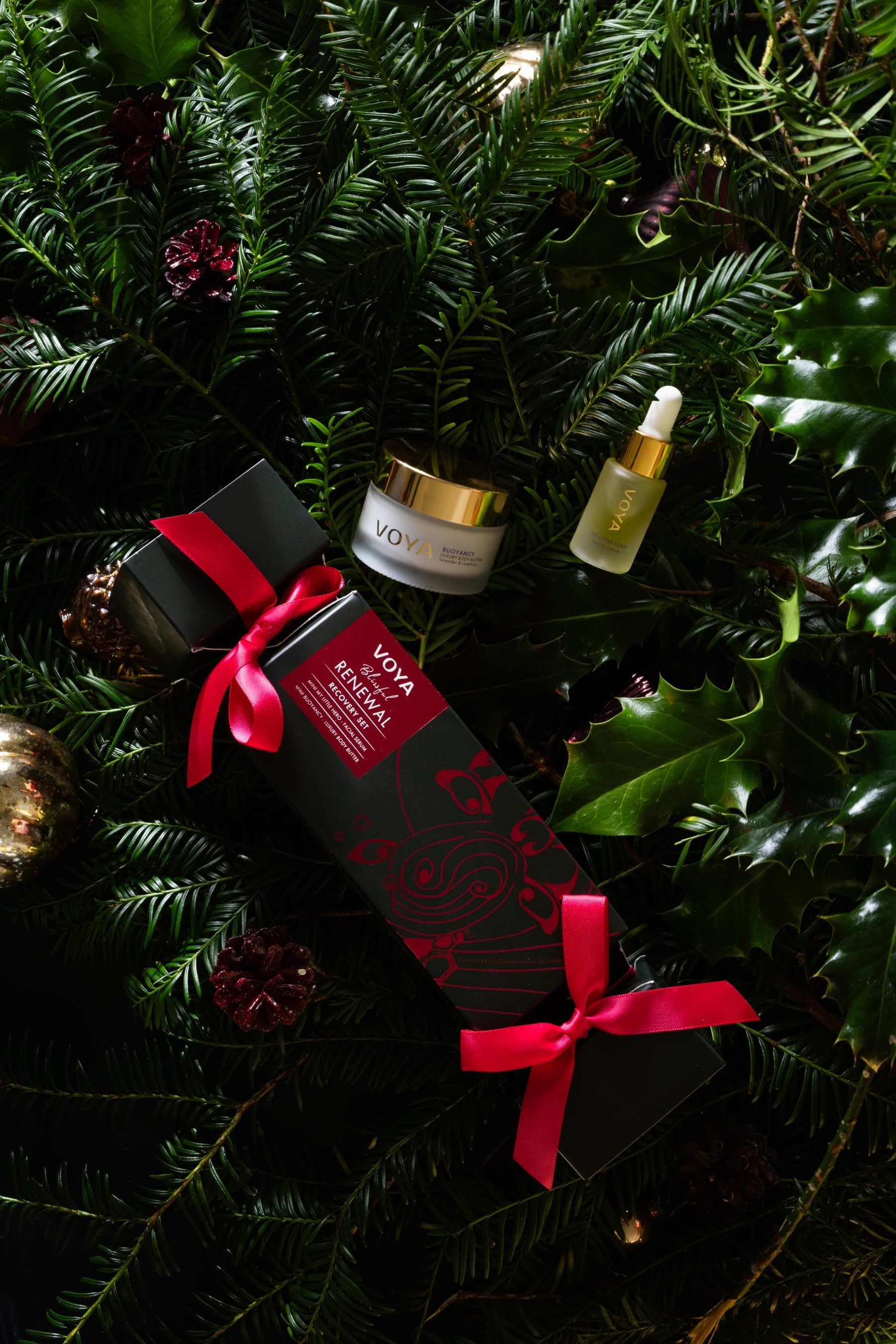 VOYA Blissful Renewal Holiday cracker containing Mini My Little Hero Face Serum and Mini Buoyancy Luxury Body Butter