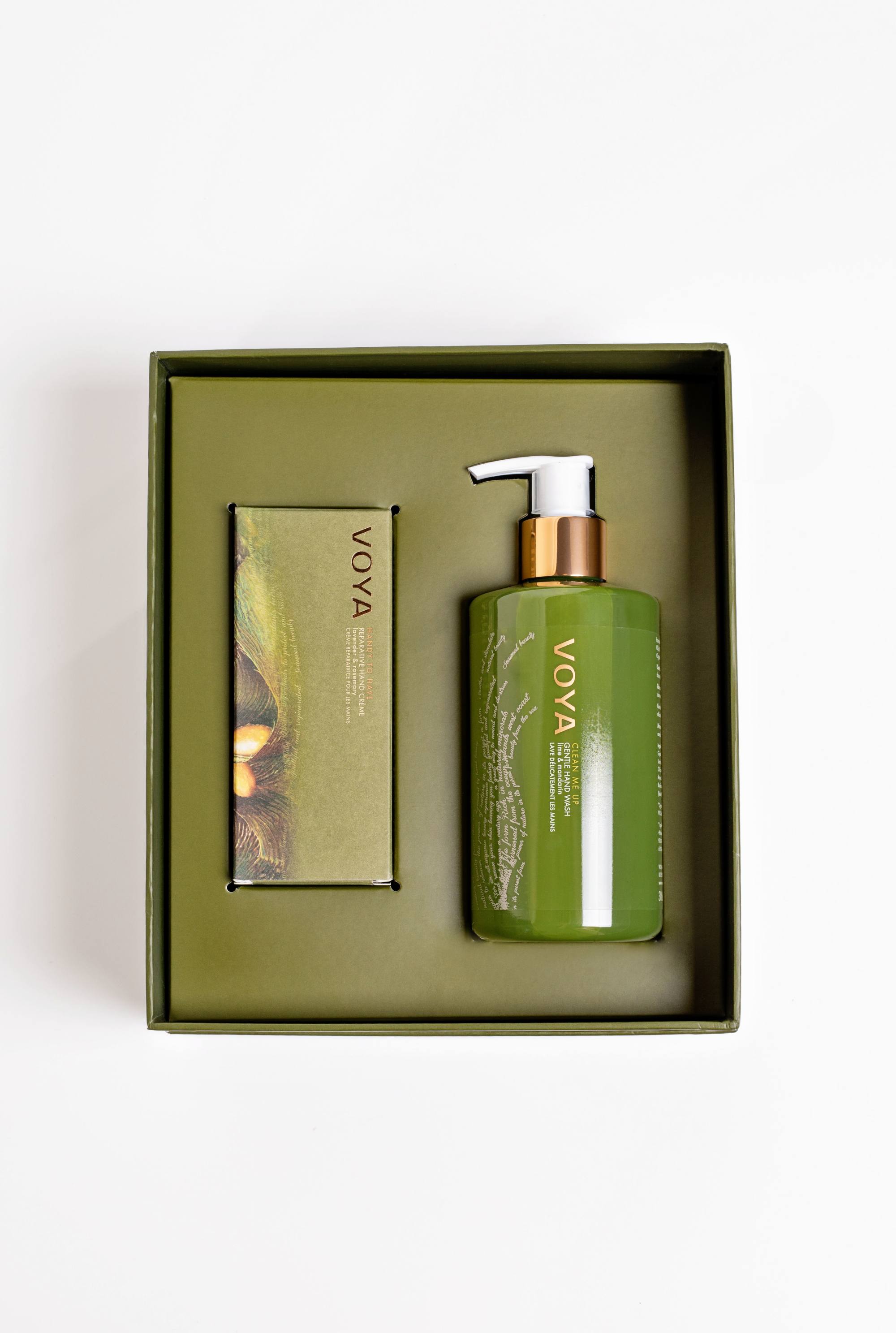 Voya hand care set with a bottle and box in a green box on a white background