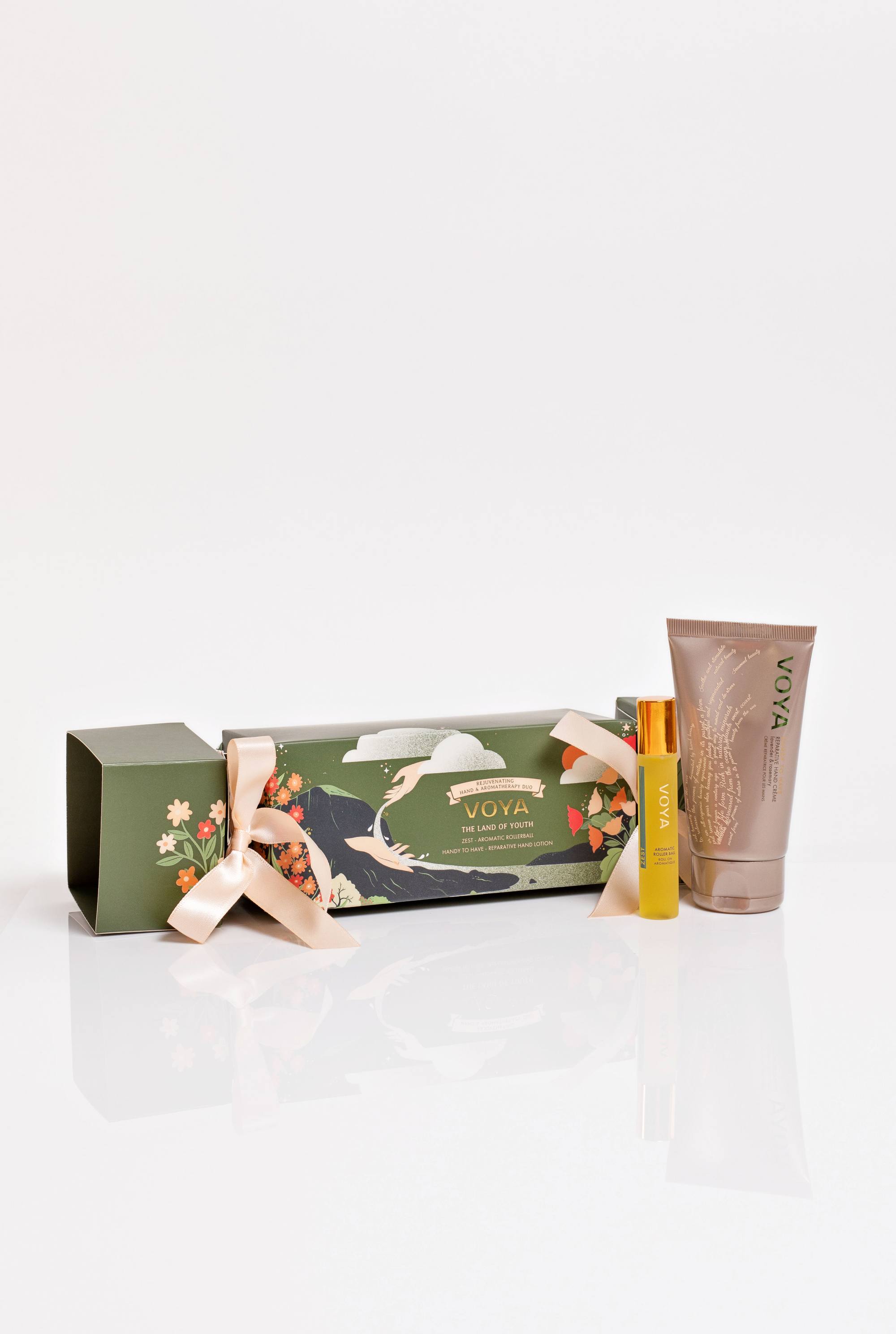 voya cracker with handy to have hand lotion and zest roller ball